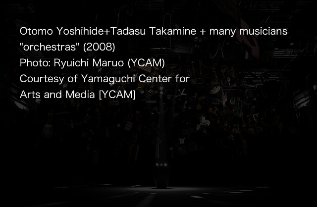 Otomo Yoshihide+Tadasu Takamine + many musicians 'orchestras' (2008)Photo: Ryuichi Maruo (YCAM)Courtesy of Yamaguchi Center for Arts and Media [YCAM]
